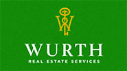 the wurlitzer real estate services logo on a green background