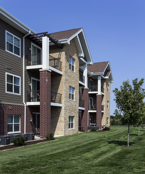 exterior shot of apartment building with large balconies