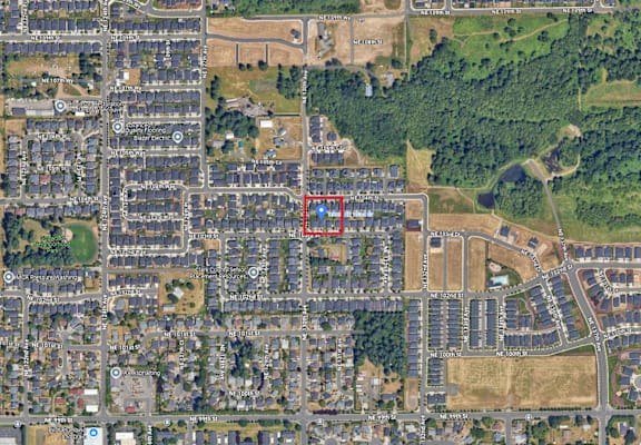 arial view of a building site with a red rectangle around it