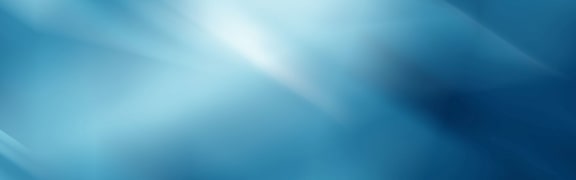 a blue ray of light shining into the sky