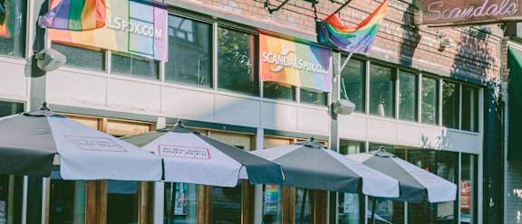 a group of umbrellas in front of a building