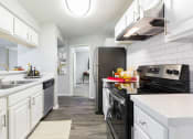 Thumbnail 1 of 41 - Kitchen at Northgreen at Carrollwood Apartments in Tampa, FL