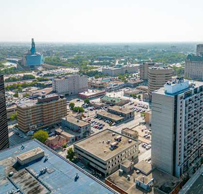 a view of the city from the top of a skyscraper