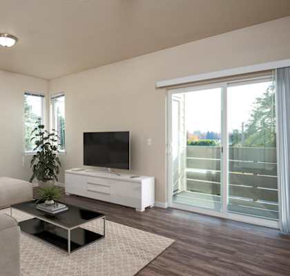 a living room with a couch and a coffee table and a television