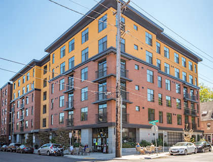 a building on the corner of a city street