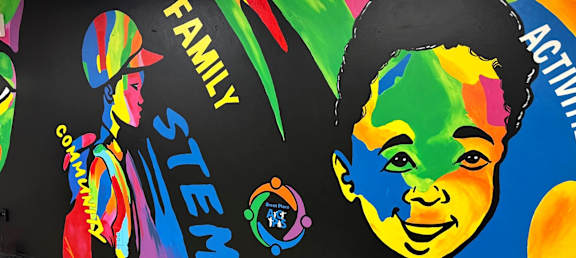 A colorful mural with the words "Family STEM Activities" written on it.