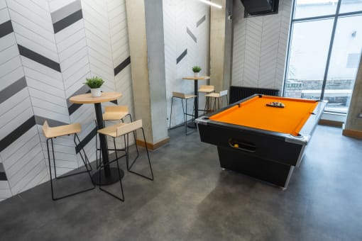 a pool table in the office