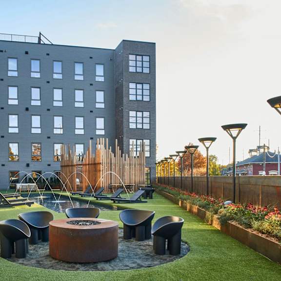 Courtyard Patio With Firepit at The Platform Apartments in Norwalk, CT