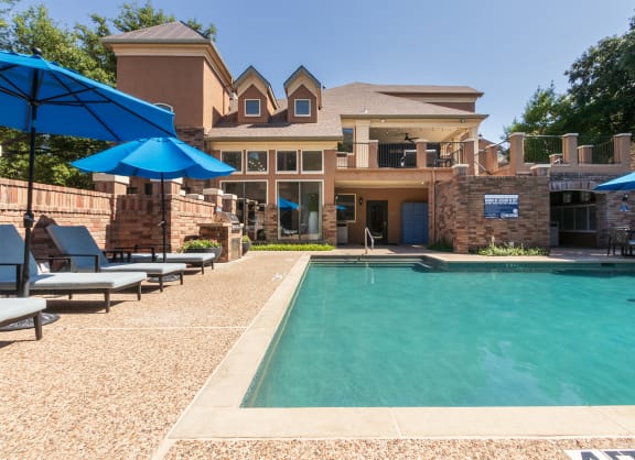 This is a photo of the pool area at The Brownstones, Dallas, 75240