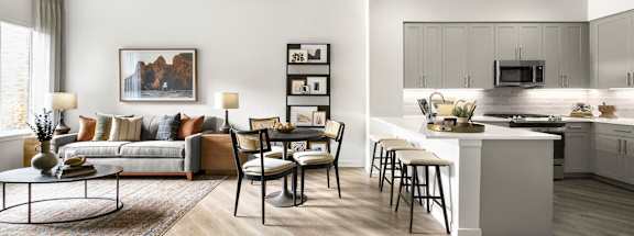 a living room with a kitchen and a dining room at The Ivy, Chatham New Jersey
