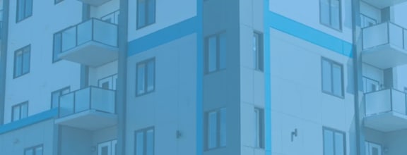 a close up of a tall building with a blue sky