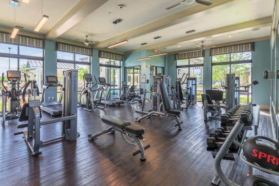 Nona Park Village Apartments pool area clubhouse with 24-hour fitness center