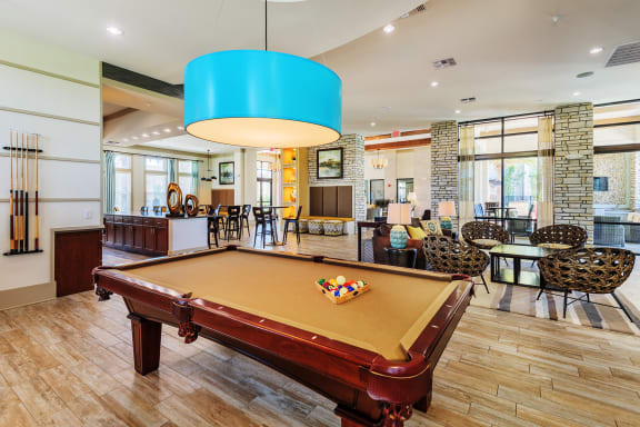 Nona Park Village Apartments pool area sports lounge