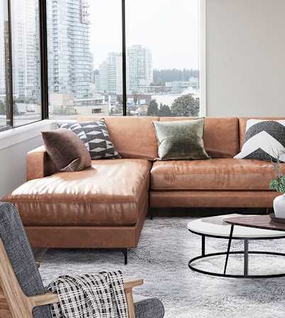 View from the living room, furnished with mid-century modern furniture. The large windows really brighten the space.