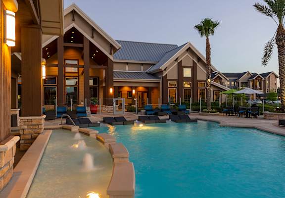 Relaxing Swimming Pool and Sundeck at Aliso Briar Forest Apartments in Houston, TX 77077