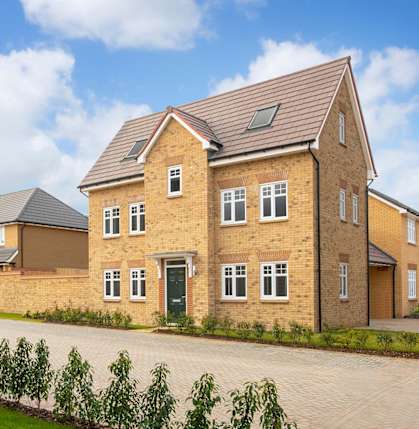 A row of houses with a clear blue sky above them.