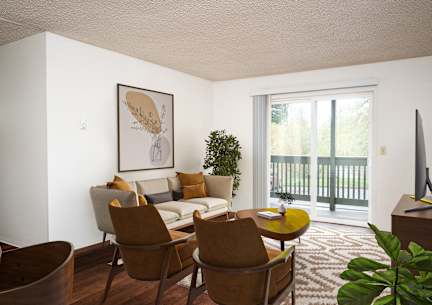 A living room with a brown chair and a brown couch.