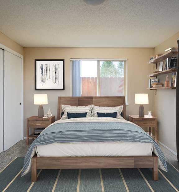 a bedroom with a bed and a window