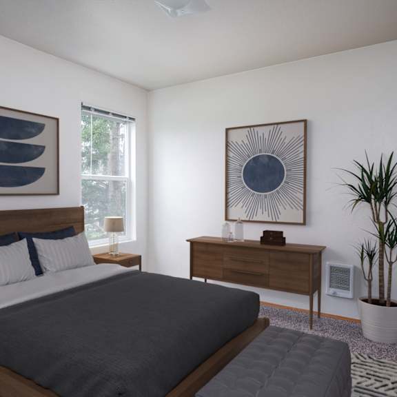 A bedroom with a large bed, a nightstand, and a plant.
