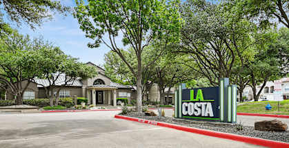 a building with a sign that says la costa