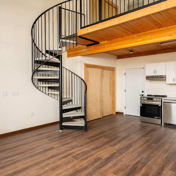 Room with a wooden floor at Atomic Orchard Experiment, Portland, OR