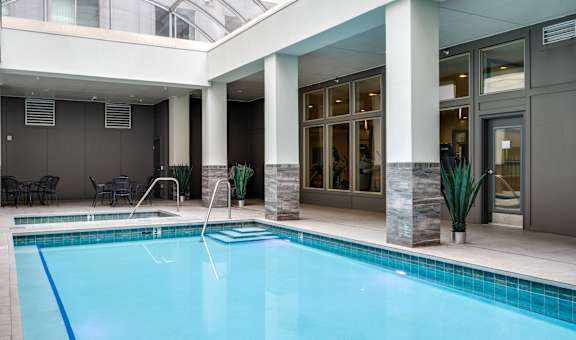 a swimming pool in the lobby of a hotel