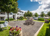 Thumbnail 10 of 32 - Farr Court Apartments Outdoor Courtyard and Seating Area