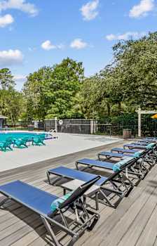 Sundeck and Pool at Reflections Apartment Homes in Gainesville, Florida, FL