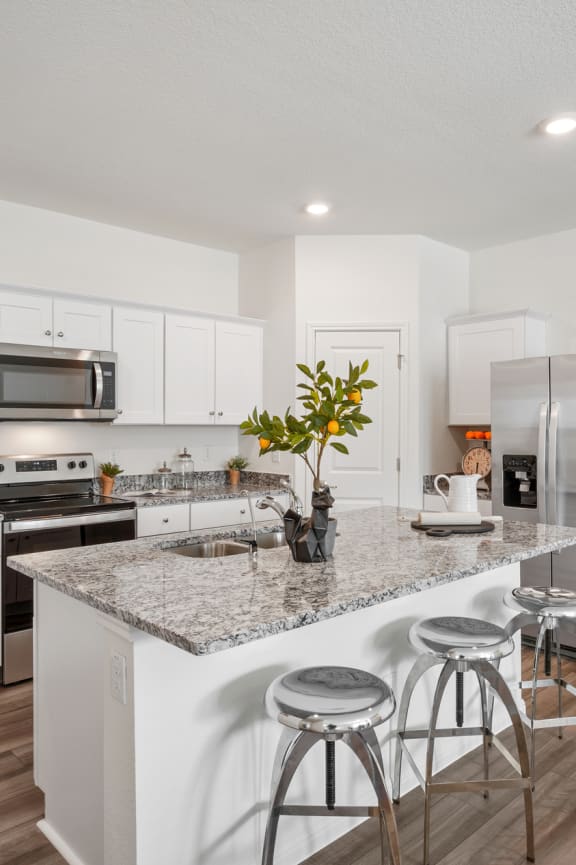 a kitchen with stainless steel appliances