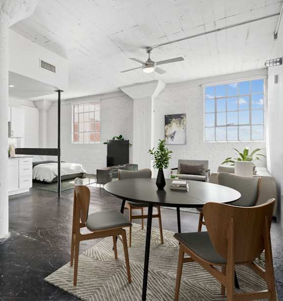 a kitchen with a stove top oven and a microwave