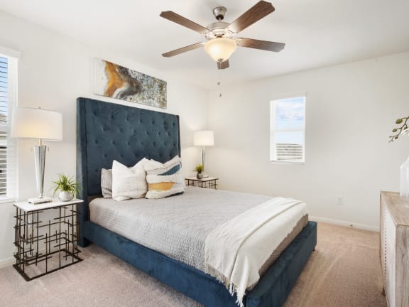a bedroom with a bed and a ceiling fan at Clinton Corners, Florida