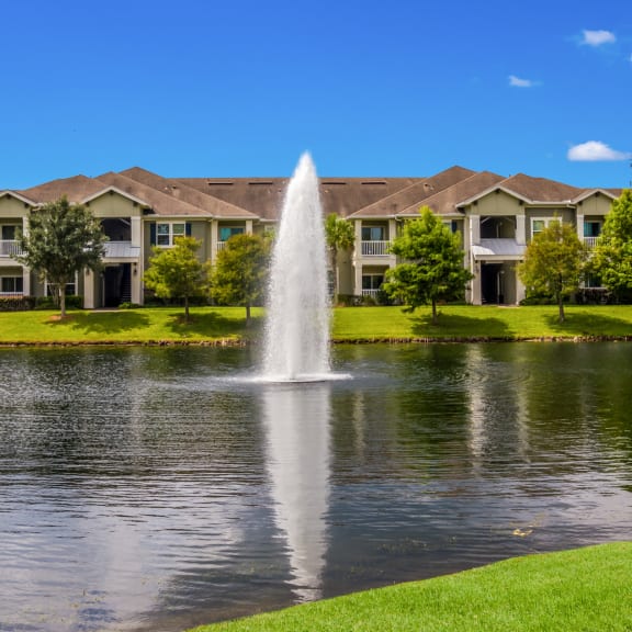 Pond with fountain and fishing access at Oakleaf Plantation in Jacksonville, FL
