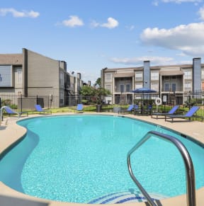Swimming Pool Area at Park at Woodlake Apartments in Houston, Texas