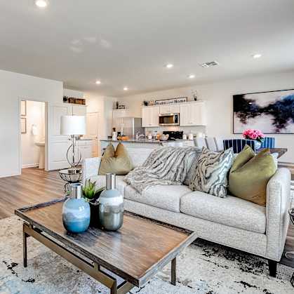 a living room with a couch and a coffee table