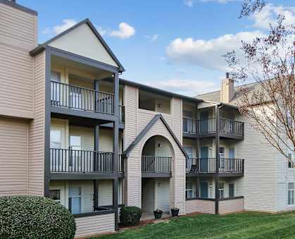 exterior view 
of Sabal Point Apartments in Pineville, NC