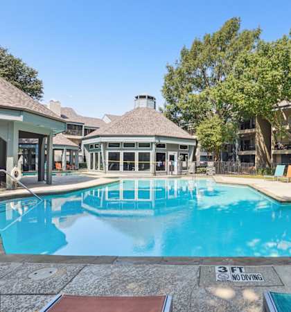 Sun-drenched pool at Laurels of Sendera apartments in Arlington, TX