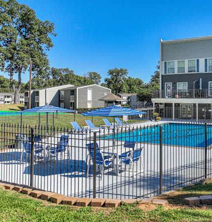 View of the entire pool area behind the leasing office at Maplewood apartments in Shreveport, LA.