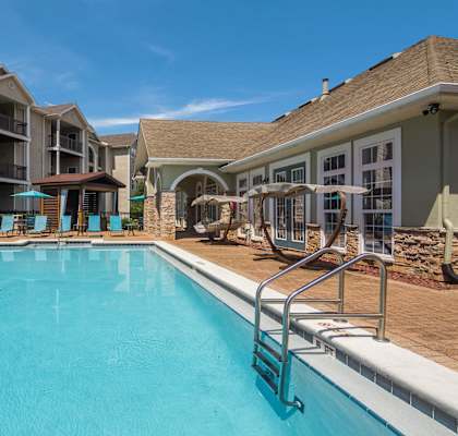 Sparkling pool by apartments at Angel Landing in Pensacola, FL