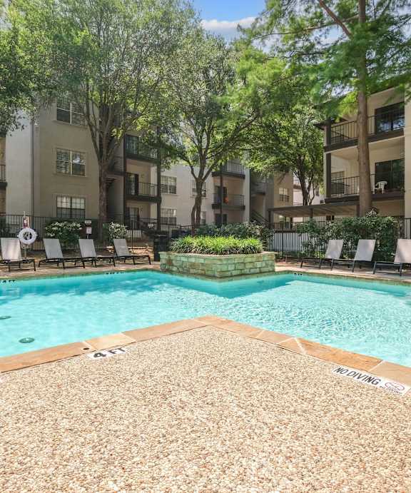Waterfall in Pool  at Jefferson Place Apartments in Irving, Texas, TX