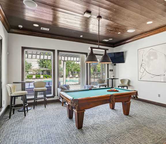 Billiards table at Hilltops Apartments in Conroe, TX