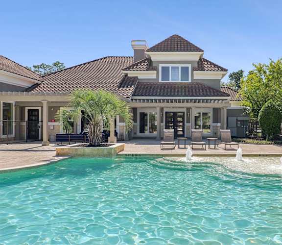Swimming pool at Hilltops Apartments in Conroe, TX