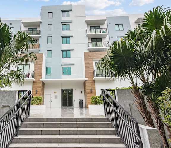 Steps leading to entryway in our midrise apartment community at Twenty2 West luxury apartments in Miami, FL