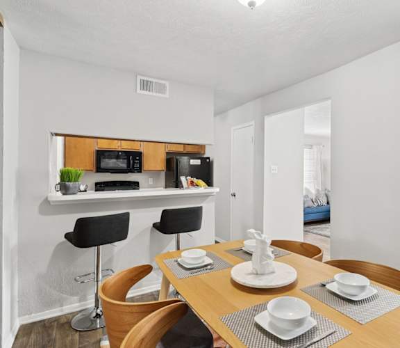 Model unit dining room at The Summit in Mesquite, TX
