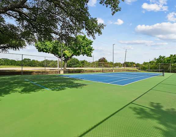 Tennis court at Chisholm Place in Plano, TX