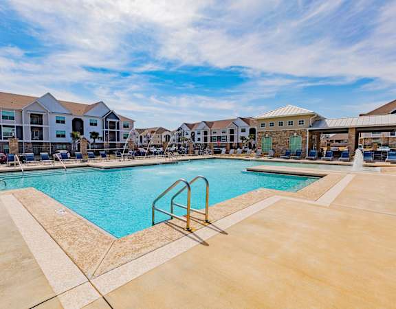 Pool Daytime at Parkside Grand Apartments in Pensacola, FL