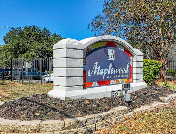 Maplewood Apartment Homes sign at Maplewood apartments in Shreveport, LA.