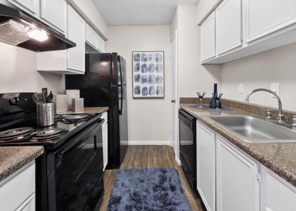 Unit Kitchen at Park at Woodlake Apartments in Houston, Texas