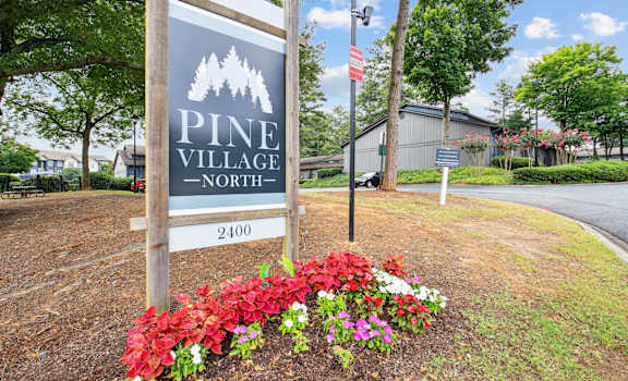 Prominent and welcoming signage at Pine Village North in Smyrna, GA