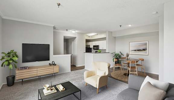 A2 floor plan living room with a fireplace and sliding glass doors that open to balcony at Jefferson Creek Apartments in Irving, TX.