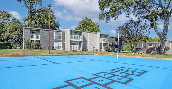Hopscotch game in front of our apartment buildings at Maplewood apartments in Shreveport, LA.